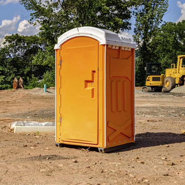 how often are the portable restrooms cleaned and serviced during a rental period in Manatee Road